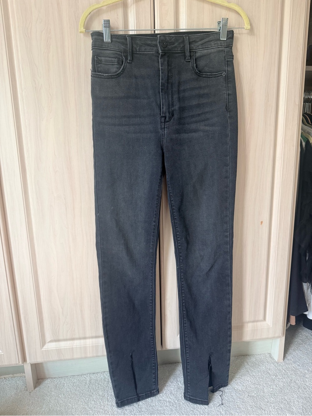 High-Rise Black Slim Jeans with Ankle Slit